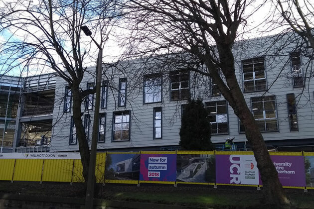 More cladding has been installed on the UCR building and the first windows are in