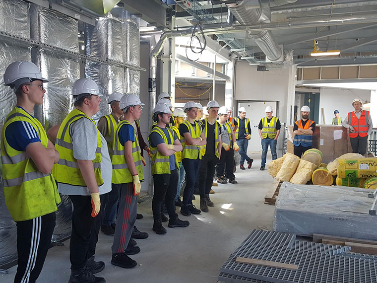 Plumbing students and apprentices from Rotherham College and North Notts College onsite at UCR