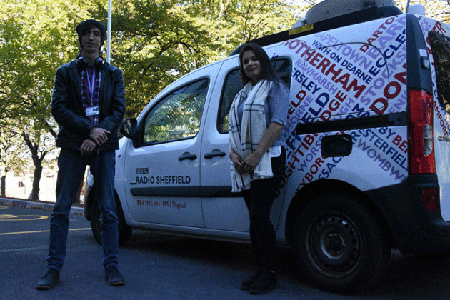 Lavin and Josh stood next to the BBC Radio Sheffield van