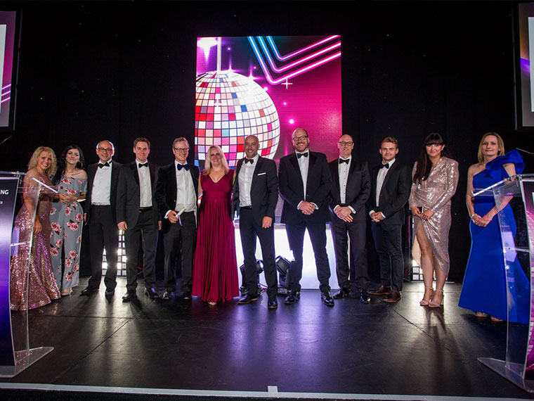 The Willmott Dixon team on stage at the construction awards ceremony.