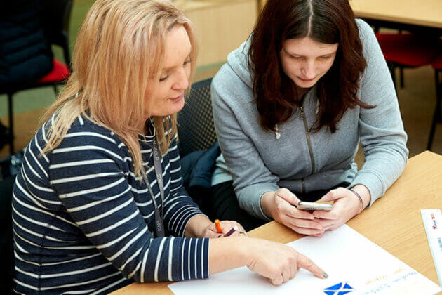 An ATS tutor with a student.