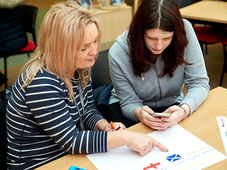 An ATS tutor with a student.