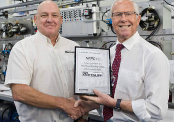 John Morris, Managing Director of Stauff UK and John R Savage, Director NFPC