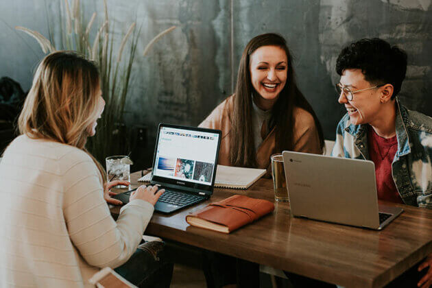 Students sat together at a desk