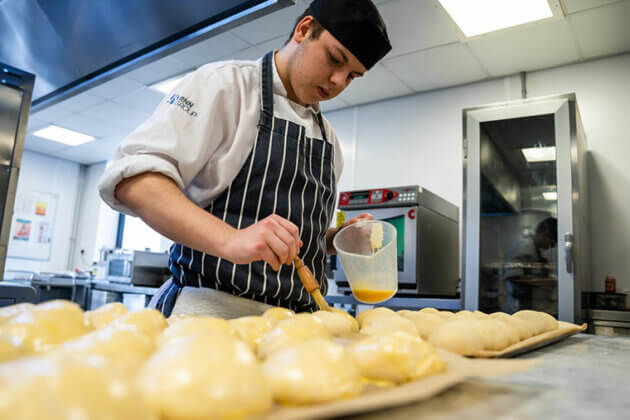 A student working in The Wharncliffe kitchen