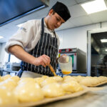 A student working in the kitchen