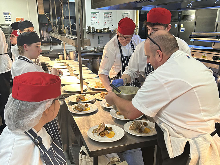 Preparing food in The Wharncliffe Restaurant at the Burns Night event in January 2024