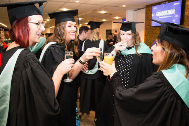 A group of students enjoying their graduation 2023 celebrations