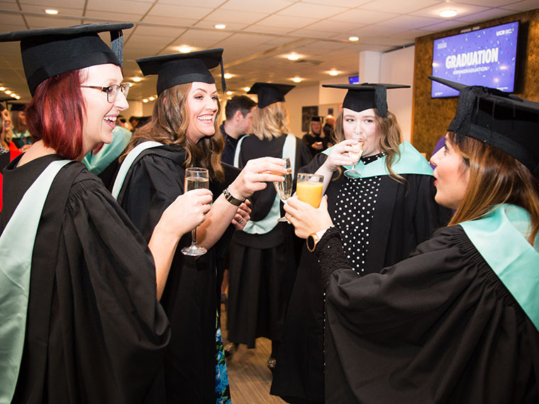 A group of students enjoying their graduation 2023 celebrations