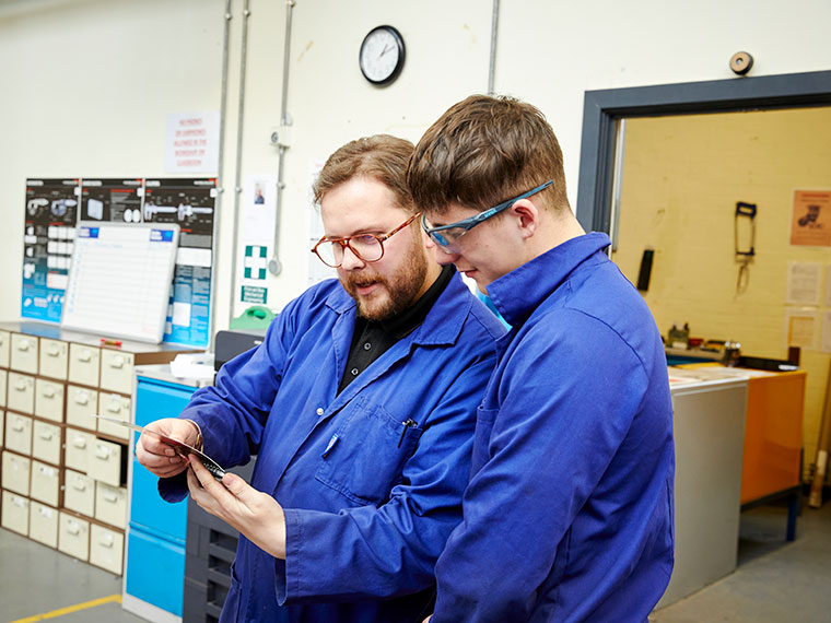 A student and tutor in the engineering department