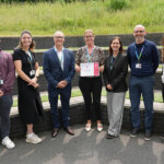 Helena Hague stood with colleagues after receiving a kudo award