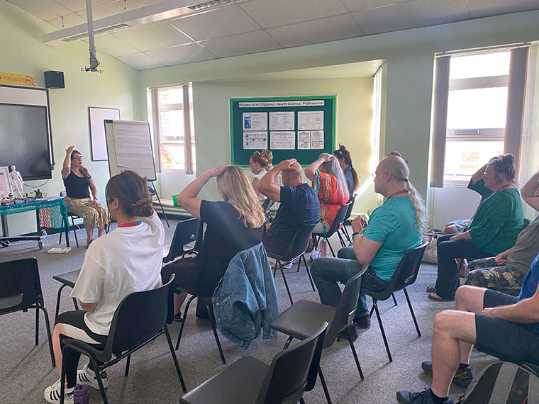 Staff taking part in an activity at a wellbeing day