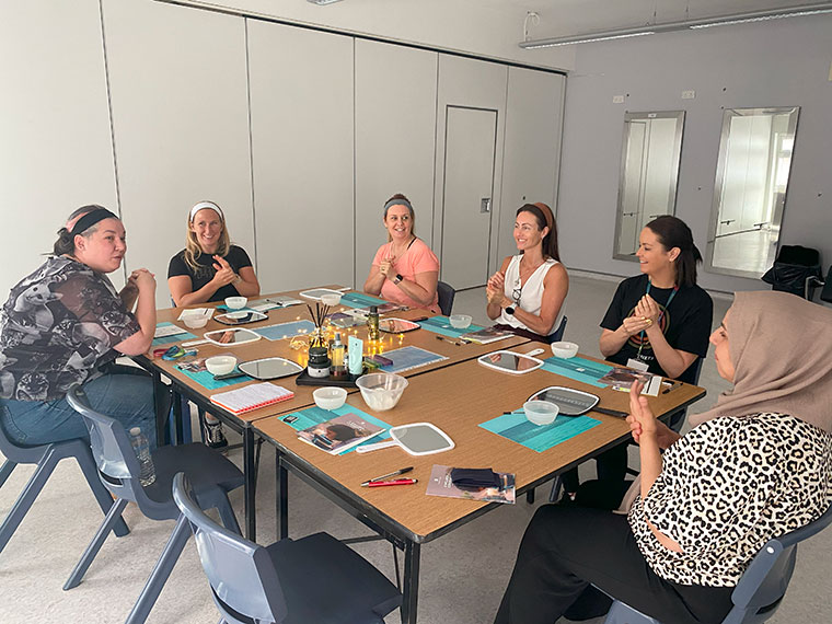 Staff taking part in an activity at a wellbeing day