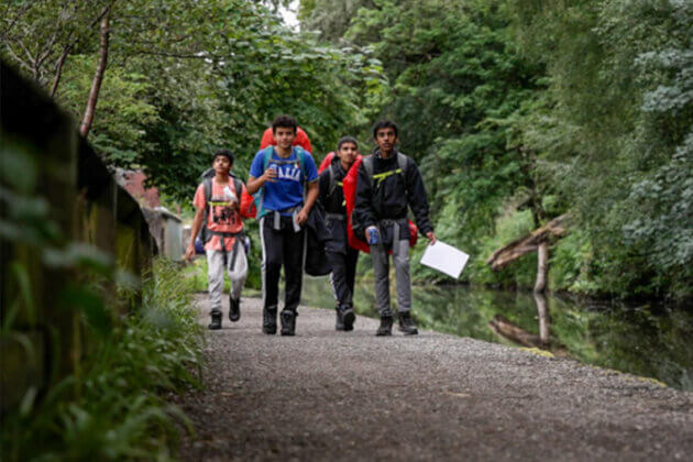 DofE Award students walking with backpacks on