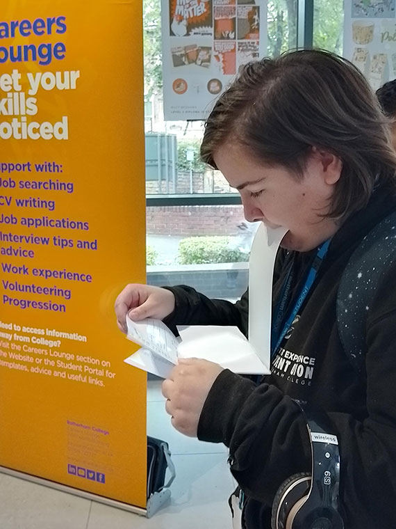 A student collecting results on GCSE