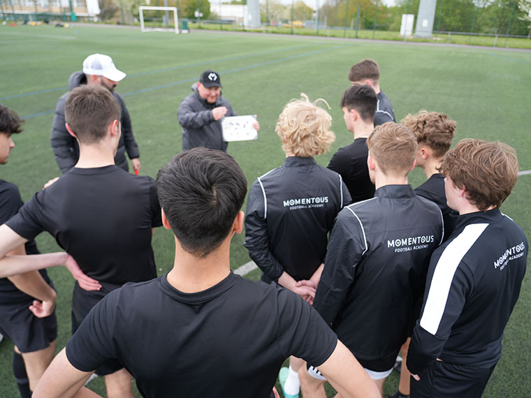 Momentous Football Academy students training outdoors