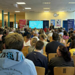 A group of people listening to the Director of Campus speak at North Notts College