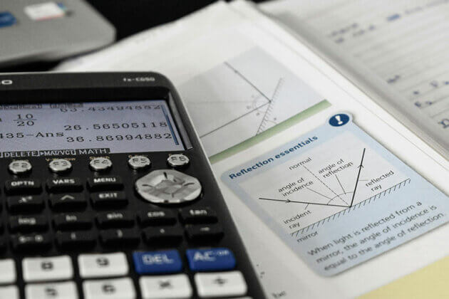 Scientific calculator and a maths book