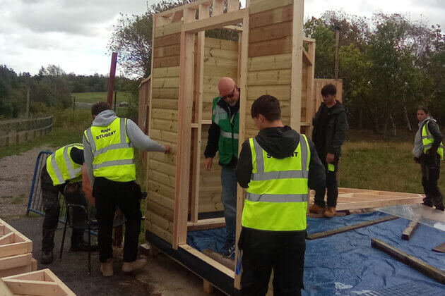 T Level students working on a construction project at Valley Wildlife