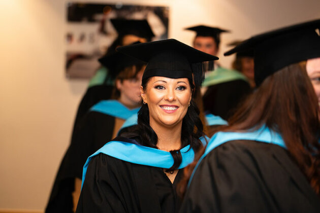 A head and shoulders shot of a student on graduation day