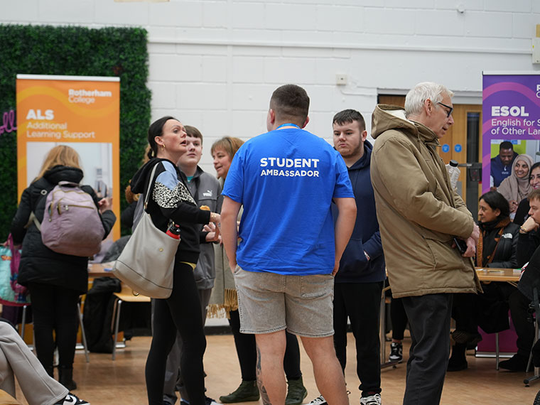 Student Ambassador Jo speaking to people at an open event