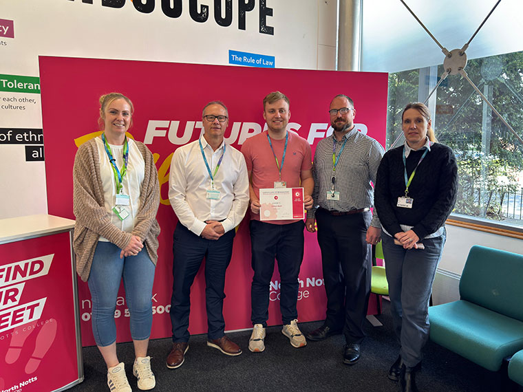 RNN Group staff member Callum receiving his Kudo award