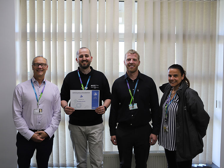 RNN Group staff member Jonathan receiving his Kudo award
