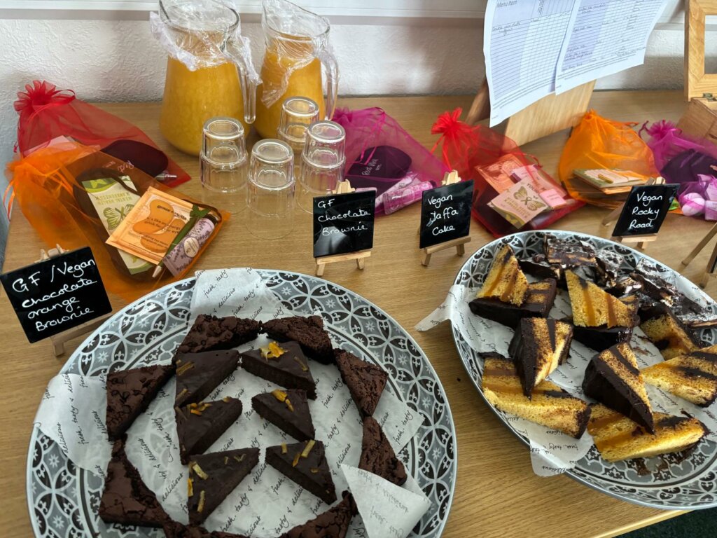 Cakes and drinks on a table for staff at RNN's wellbeing drop in session